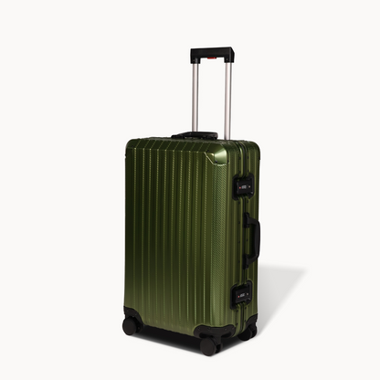 Green suitcase with a black handle and wheels on a white background