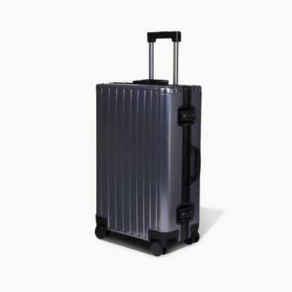 CHAVELLE aluminium suitcase gun metal angled view showing reinforced corners and sleek finish 