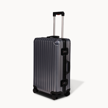 Black and silver suitcase on a white background
