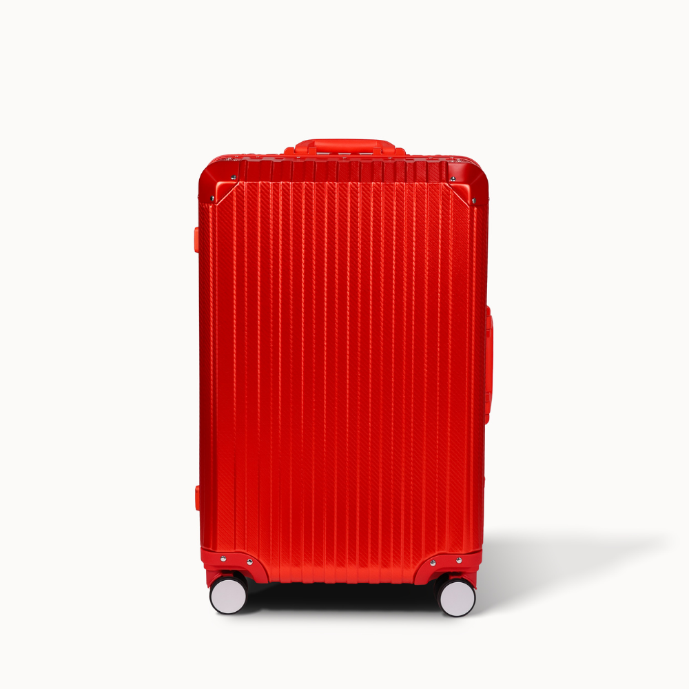 Red suitcase on a white background