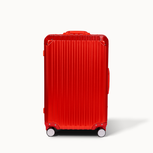 Red suitcase on a white background