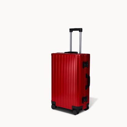 CHAVELLE aluminium suitcase cherry red angled view showing reinforced corners and sleek finish 