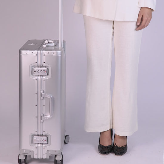 Video of CHAVELLE luxury aluminium suitcase size explained with model for real-life dimensions