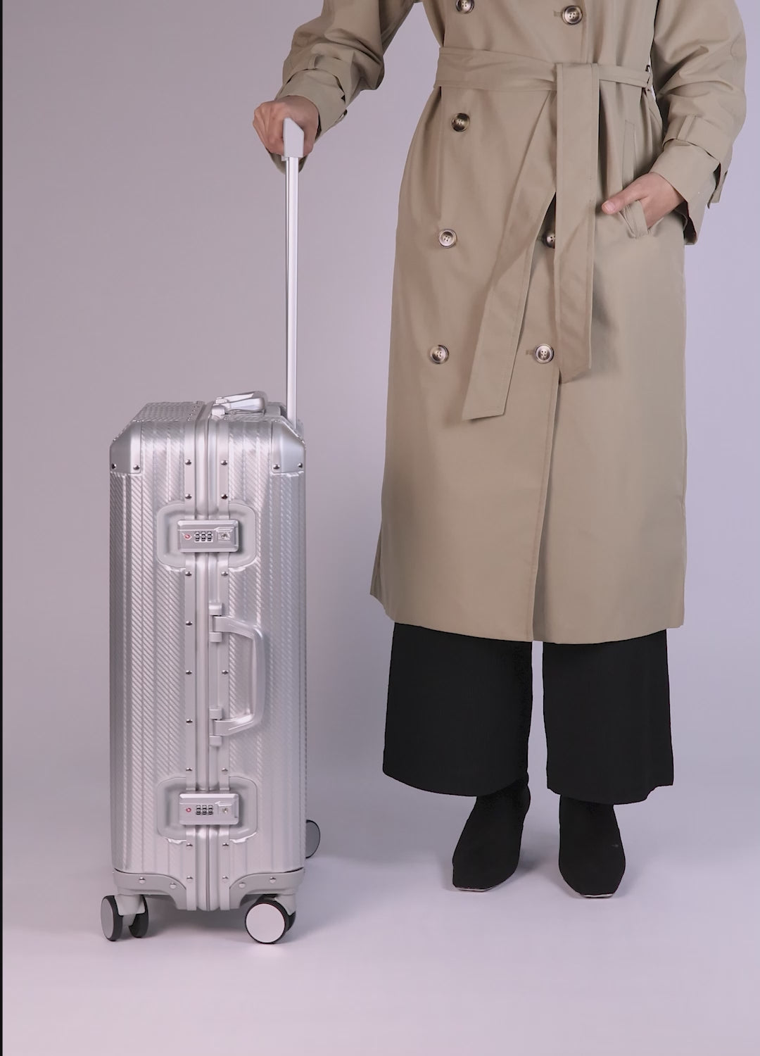 Women Holding CHAVELLE Luggage