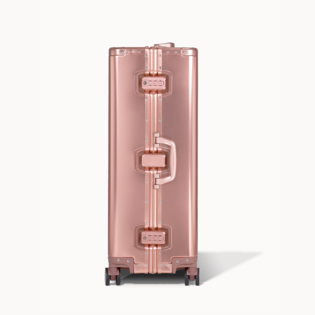 CHAVELLE aluminium suitcase rose gold close-up of TSA-approved lock and side handle