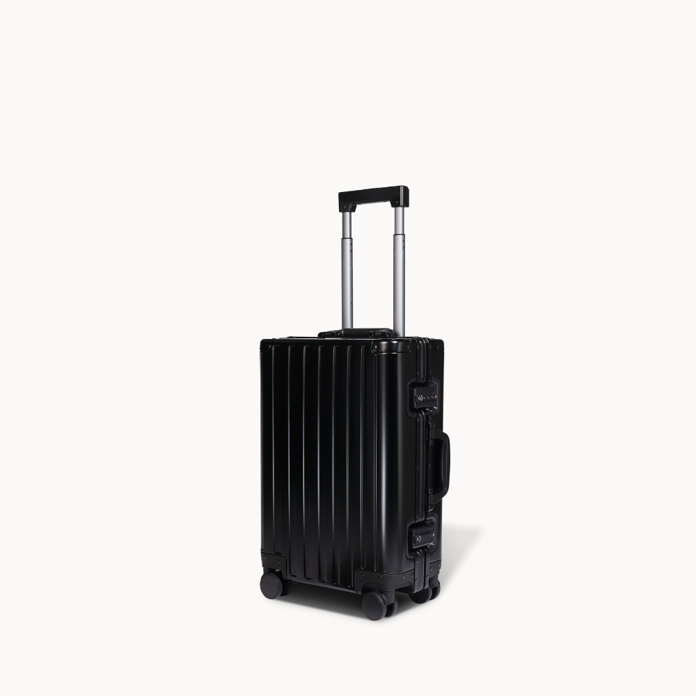 CHAVELLE aluminium suitcase black angled view showing reinforced corners and sleek finish 
