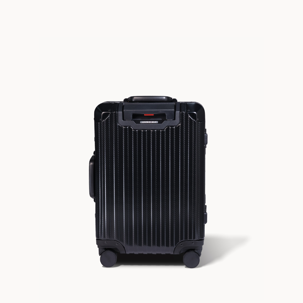 Black suitcase with a brand logo on a white background