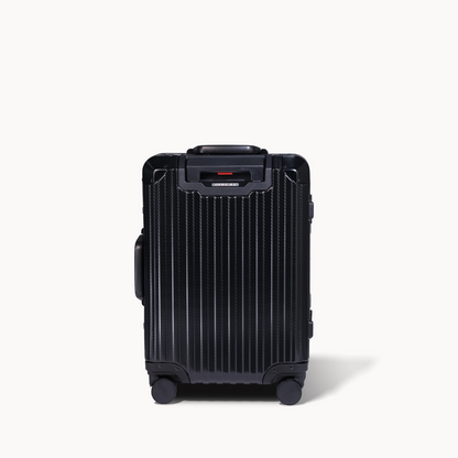 Black suitcase with a brand logo on a white background
