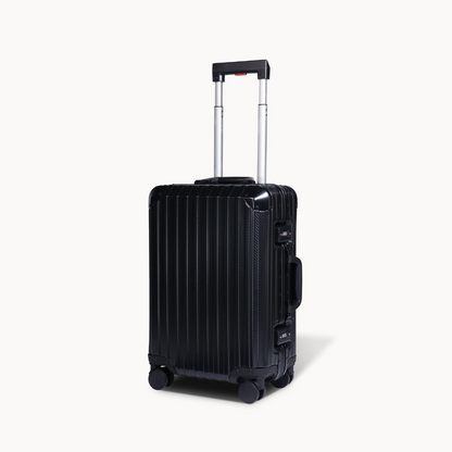 Black suitcase with a striped pattern on a white background