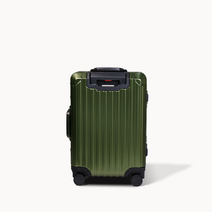 Green suitcase with black handle and wheels on a white background
