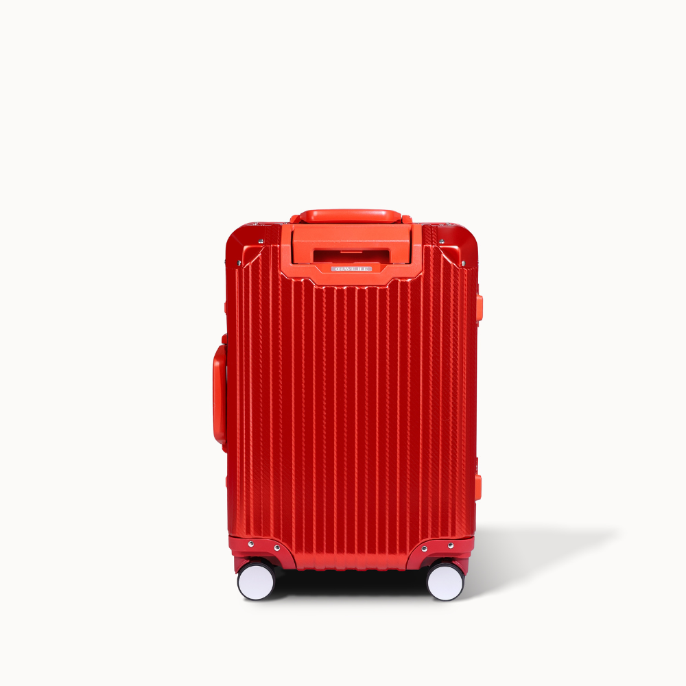 Red suitcase with a white background