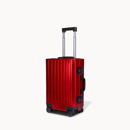 CHAVELLE aluminium suitcase cherry red angled view showing reinforced corners and sleek finish 