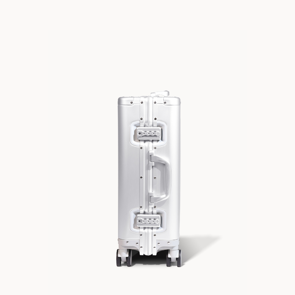 CHAVELLE aluminium suitcase silver close-up of TSA-approved lock and side handle